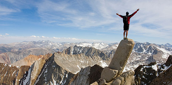 Boy Climbing Mountain