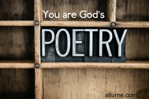 The word "POETRY" written in vintage metal letterpress type in a wooden drawer with dividers.